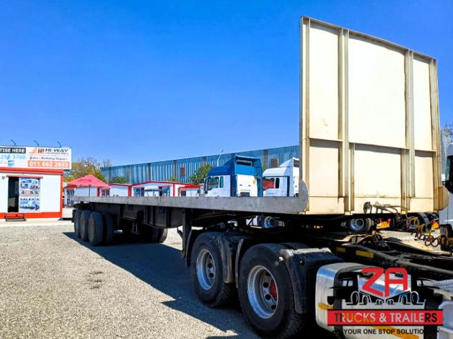 2014 HENRED FRUEHAUF TRI-AXLE FLAT DECK TRAILER #53212